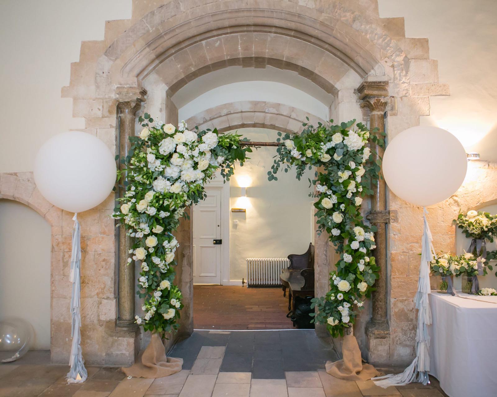 Floral arrangement over the arch in to Farnham Castle