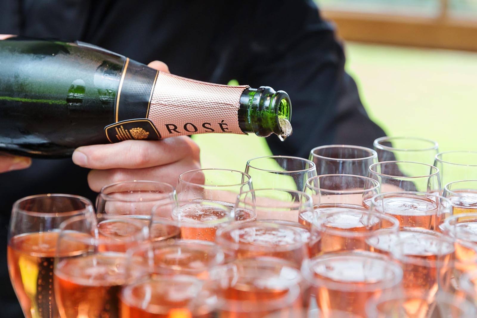 Champagne being poured at a Farnham Castle wedding reception