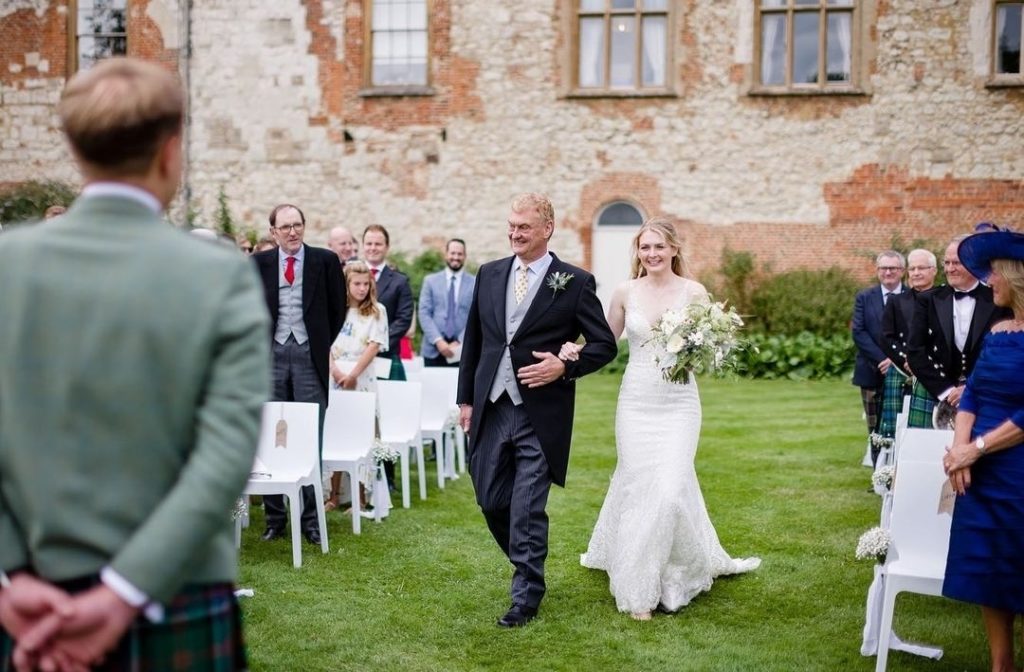 Outdoor wedding ceremony at Farnham Castle Surrey