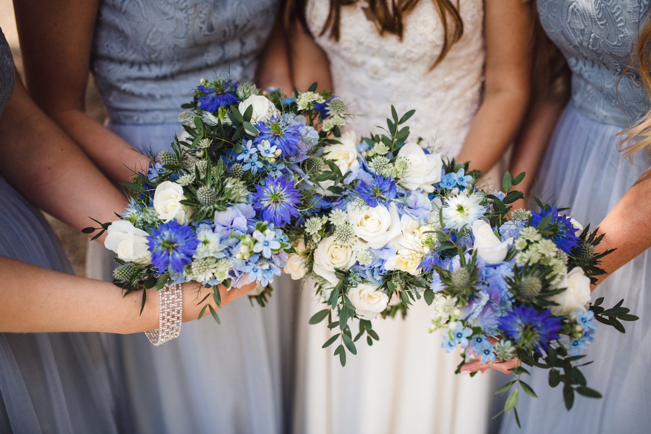 Blue bridal and bridesmaid flowers at Farnham Castle