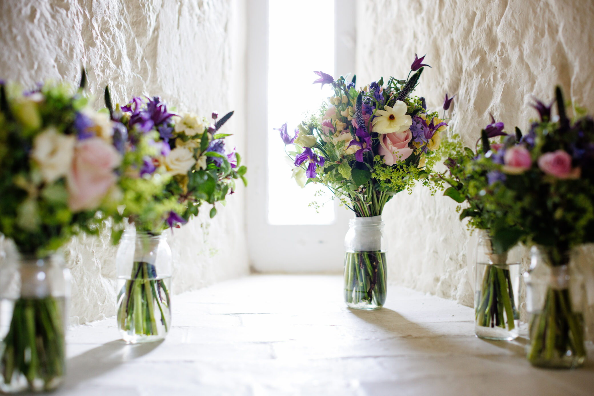 Bouquets of bridal party flowers at Farnham Castle